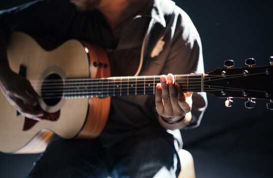 Musician playing guitar