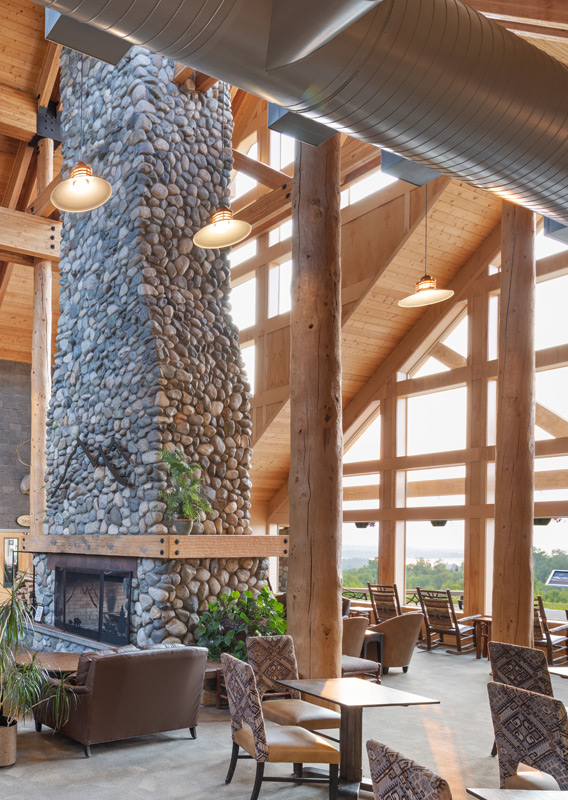 A stone fireplace in the Talkeetna Alaskan Lodge lobby
