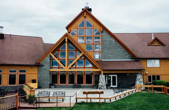 Exterior shot of the Talkeetna Alaskan Lodge viewing deck.