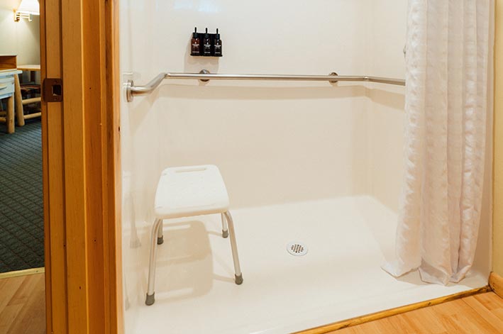 A hotel bathroom with a shower.